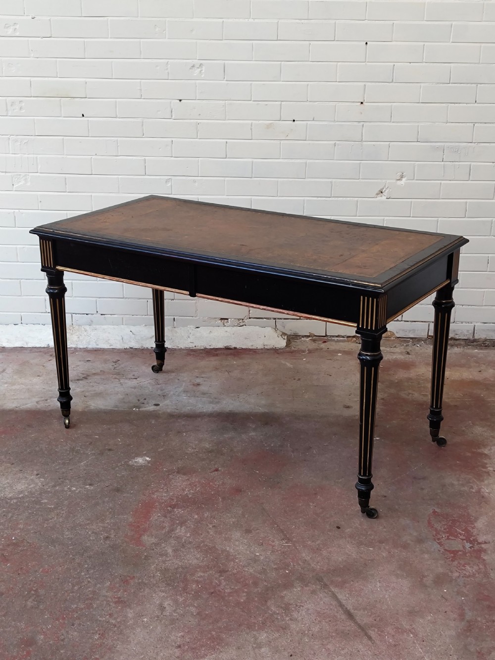 Antique Victorian English Aesthetic Movement ebonised Leather Top Library Writing Table