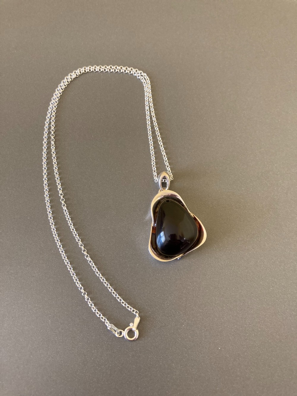 Danish Silver Pendant with Large Polished Cherry Amber. 1960s.