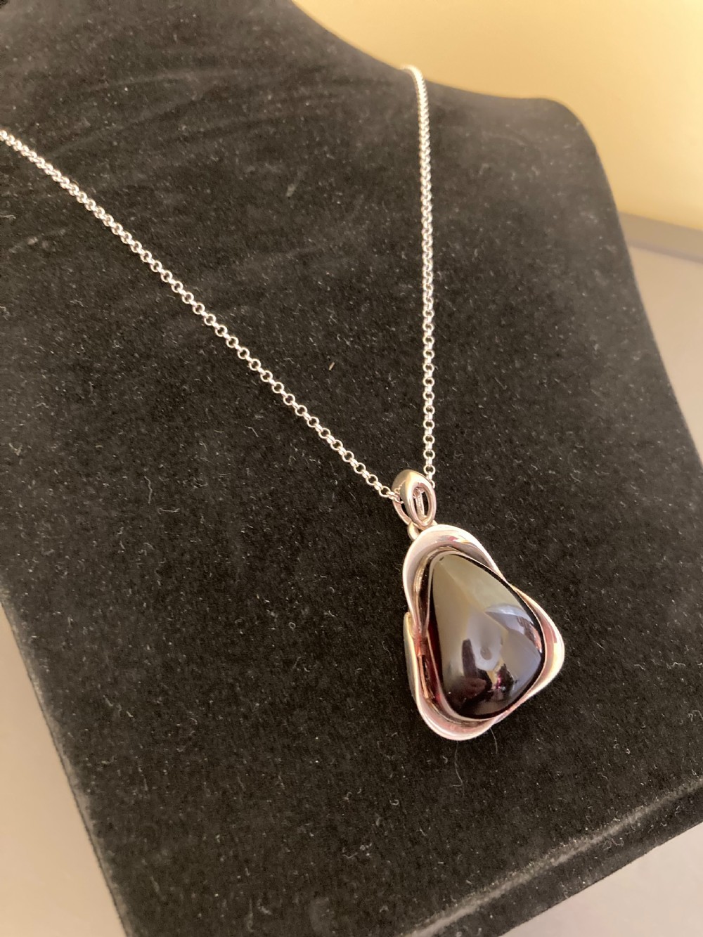 Danish Silver Pendant with Large Polished Cherry Amber. 1960s. View IV
