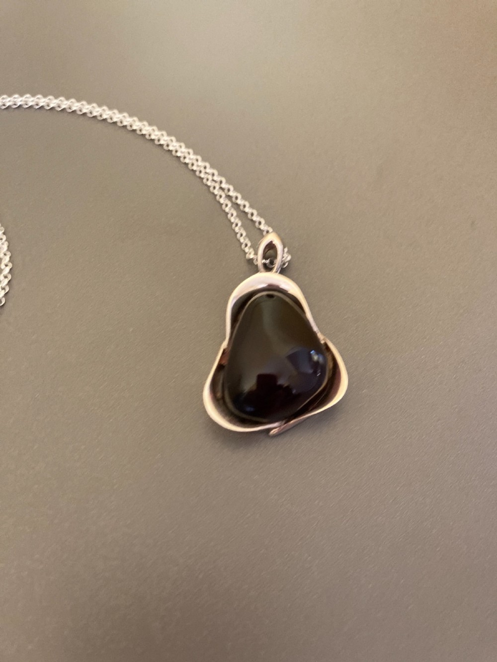 Danish Silver Pendant with Large Polished Cherry Amber. 1960s. View VI