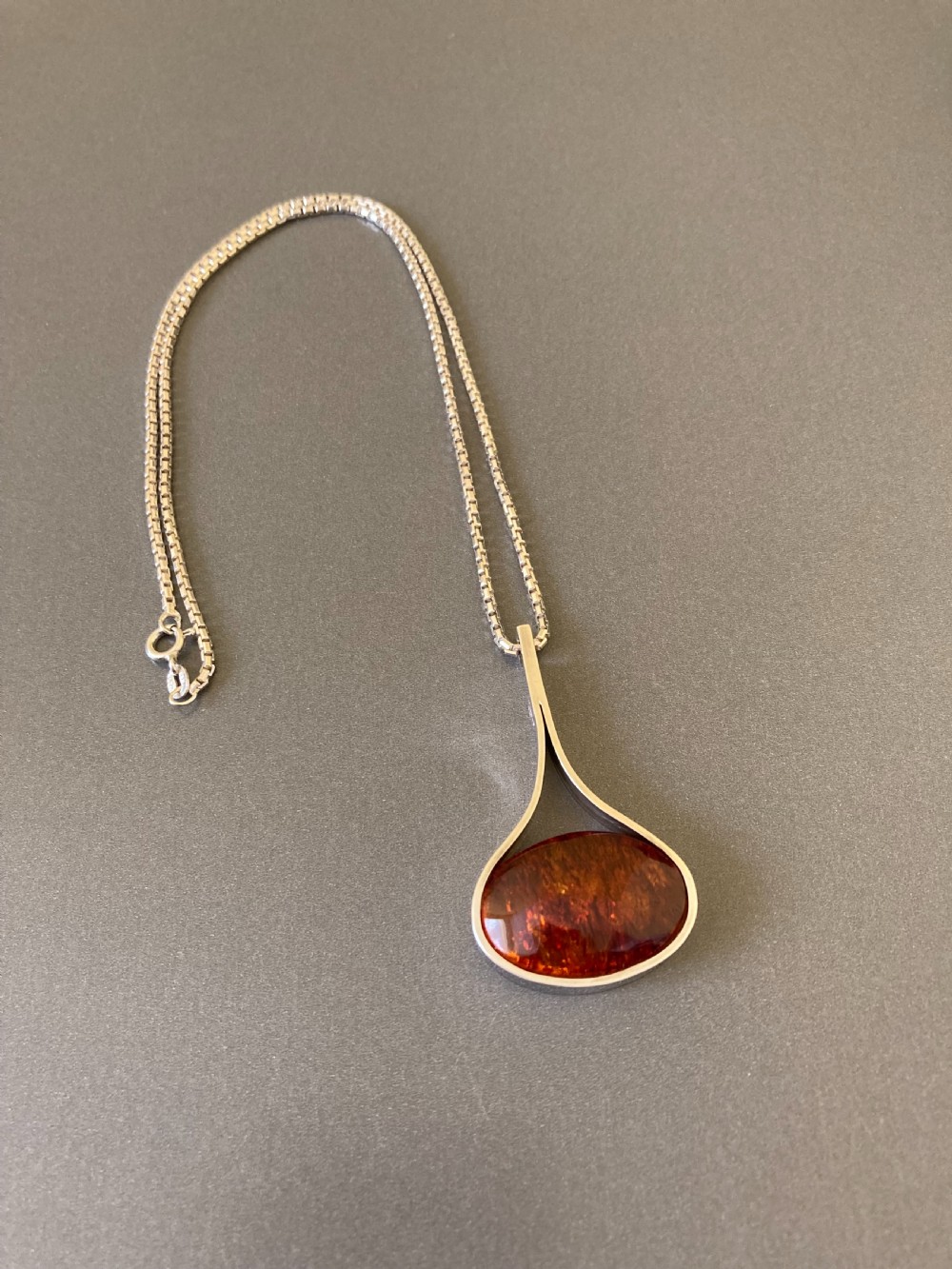Danish Silver and Amber Pendant. By Einer Fehr. 1960s.