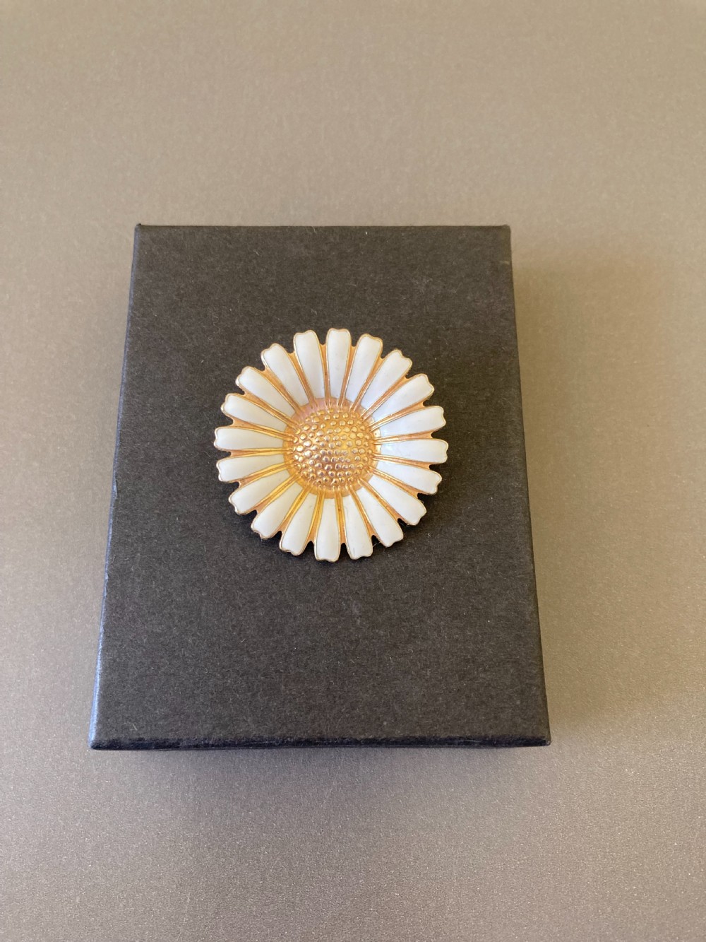 Danish Silver Gilt and White Enamel Brooch. 1950s. By Bernhard Hertz.