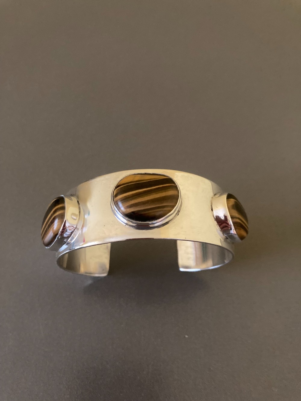 Danish Silver Bangle with Tigers Eyes. By Arne Johansen. 1960s.