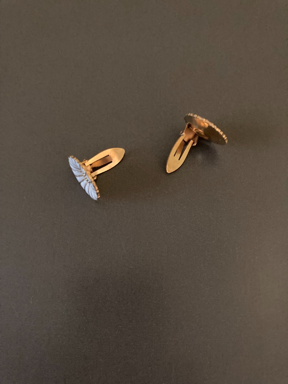 A pair of vintage Danish silver gilt daisy earrings featuring white enamelled petals and a textured gold centre. View IV