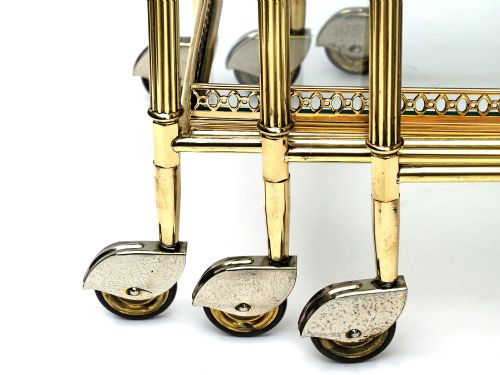 RARE NEST OF BRASS TROLLEY TABLES BY MAISON BAGUS - ADDITIONAL PHOTO 1
