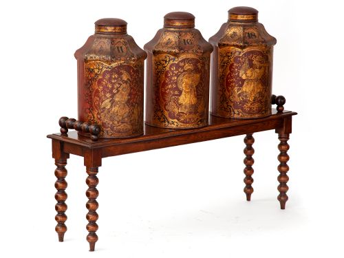 SET OF THREE PAGODA STYLE MAROON CHINA TEA CANISTERS