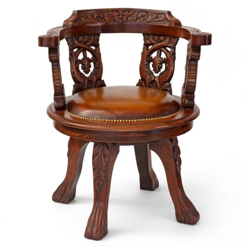HEAVILY CARVED FULLY ROTATING OAK SHIPS CHAIR - ADDITIONAL PHOTO 1