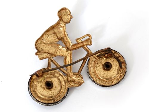 PRESSED BRASS CYCLING BROOCH WITH WORKING WHEELS - ADDITIONAL PHOTO 1