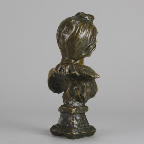fig 4. An Art Nouveau patinated bronze bust titled Silvia, featuring a female portrait sculpture on an integrated cast base.
