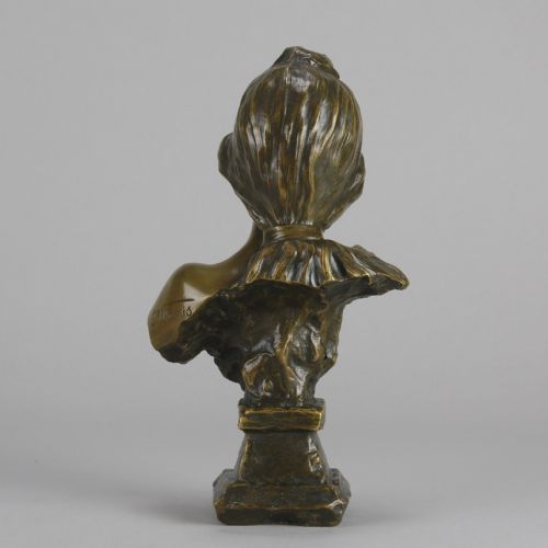 fig 6. An Art Nouveau patinated bronze bust titled Silvia, featuring a female portrait sculpture on an integrated cast base.