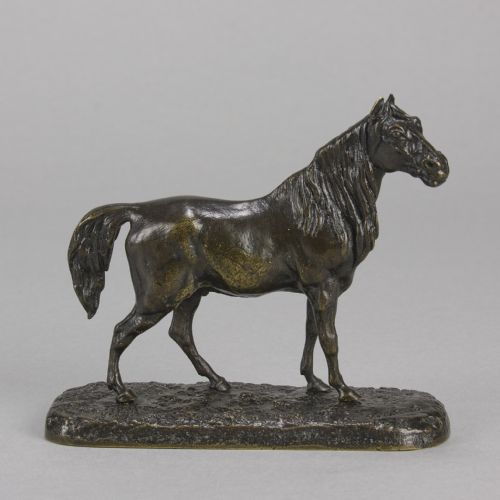 fig 2. A nineteenth-century dark patinated bronze sculpture depicting a standing Arabian horse on a textured ground base.