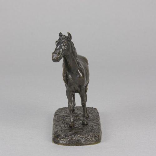 fig 4. A nineteenth-century dark patinated bronze sculpture depicting a standing Arabian horse on a textured ground base.