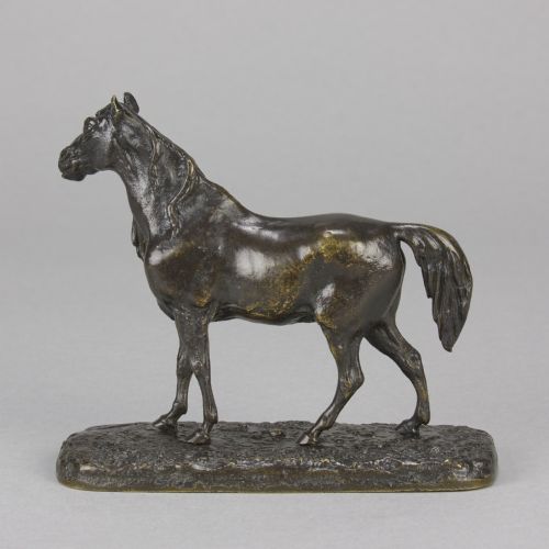 fig 5. A nineteenth-century dark patinated bronze sculpture depicting a standing Arabian horse on a textured ground base.