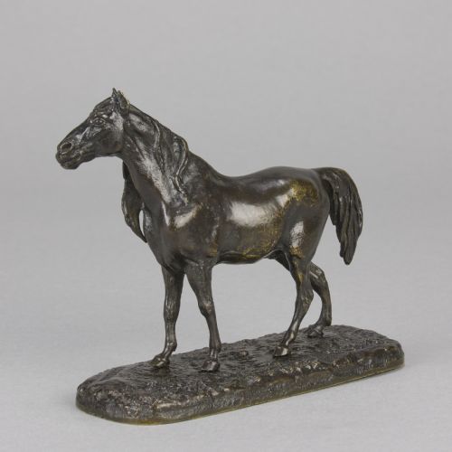 fig 6. A nineteenth-century dark patinated bronze sculpture depicting a standing Arabian horse on a textured ground base.