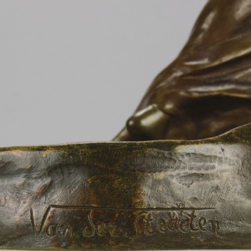 fig 2. A late 19th-century Art Nouveau patinated bronze figure of a draped female standing on an organic tray base.