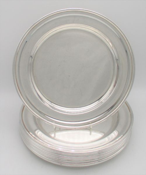 A Rare Set of 10 Silver Plated Dinner Plates