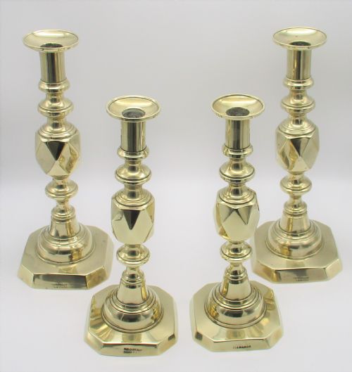 fig 1. Set of 4 Brass Candlesticks - King & Queen of Diamonds 1897