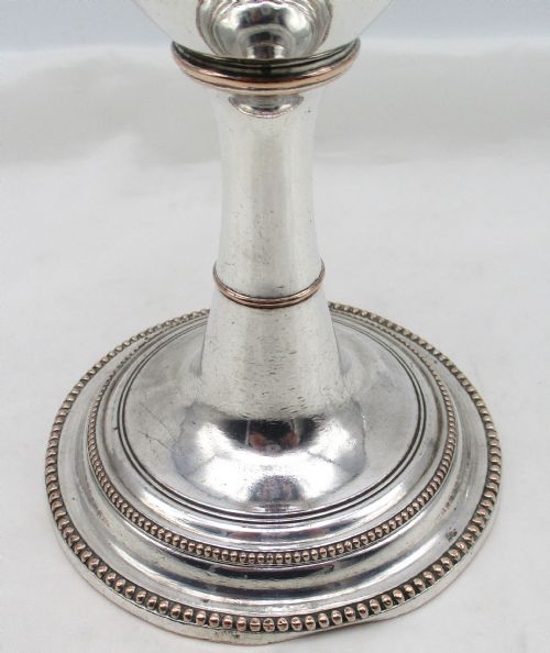 fig 1. An 18th-century Sheffield plated silver chalice featuring a tapered bowl, a turned stem, a beaded foot rim, and a gilded interior.