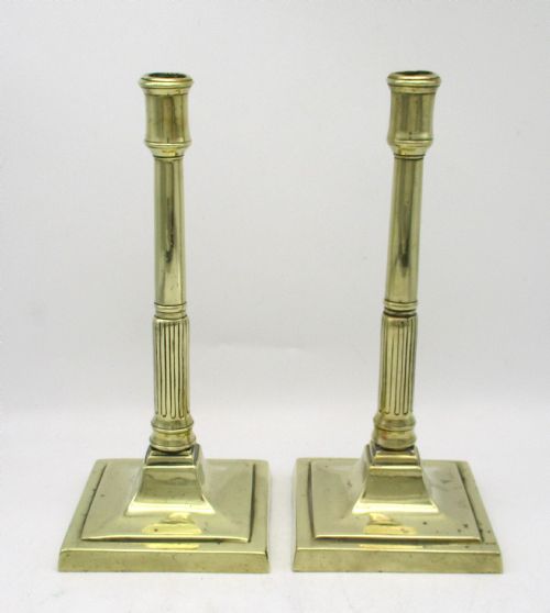 PAIR OF 18TH19TH CENTURY BRASS COLUMN CANDLESTICKS - ADDITIONAL PHOTO 1