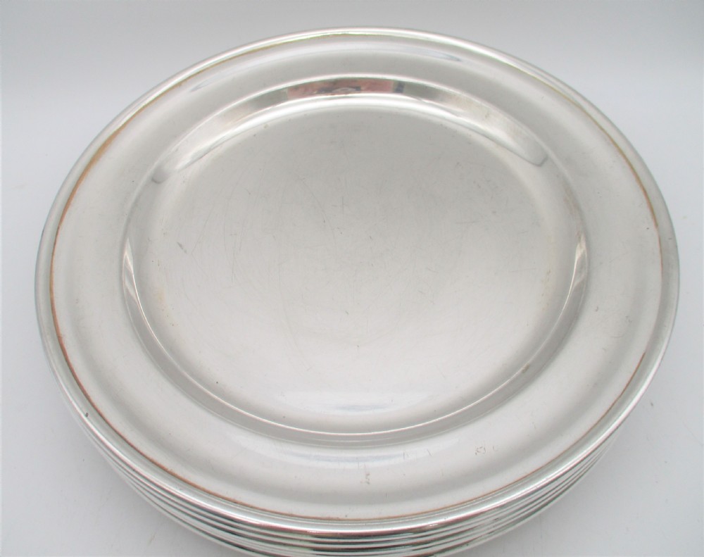 A Rare Set of 10 Silver Plated Dinner Plates View III