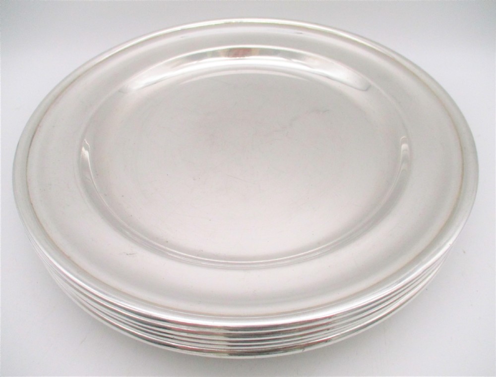 A Rare Set of 10 Silver Plated Dinner Plates View VI