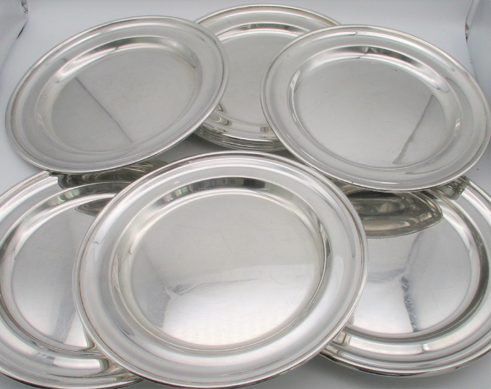 A Rare Set of 10 Silver Plated Dinner Plates View X