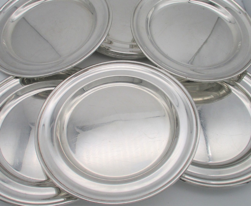 A Rare Set of 10 Silver Plated Dinner Plates View XI