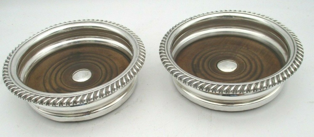 A Fine Pair of 19th Century Silver Plated Wine Bottle Coasters