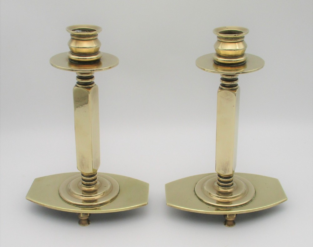 A Fabulous Pair of Arts & Crafts Brass Candlesticks