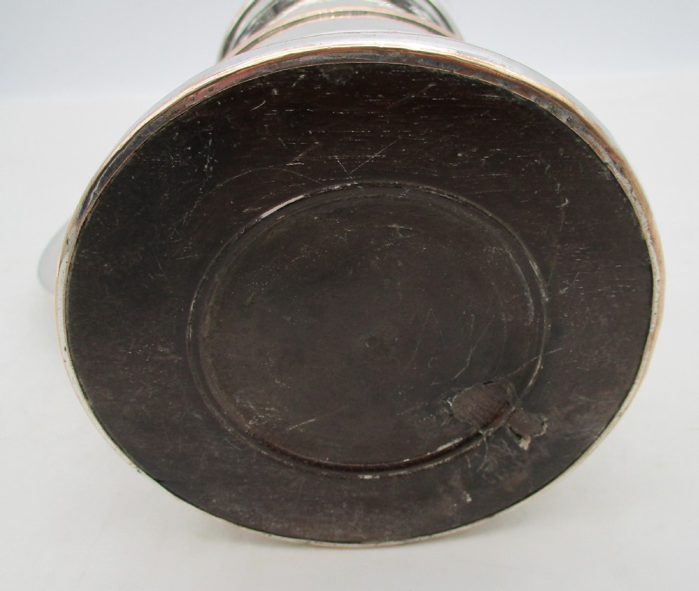 An 18th-century Old Sheffield plated silver quart tankard featuring a domed lid, thumbpiece, scroll handle, and visible copper bleeding along the moulded edges. View VIII