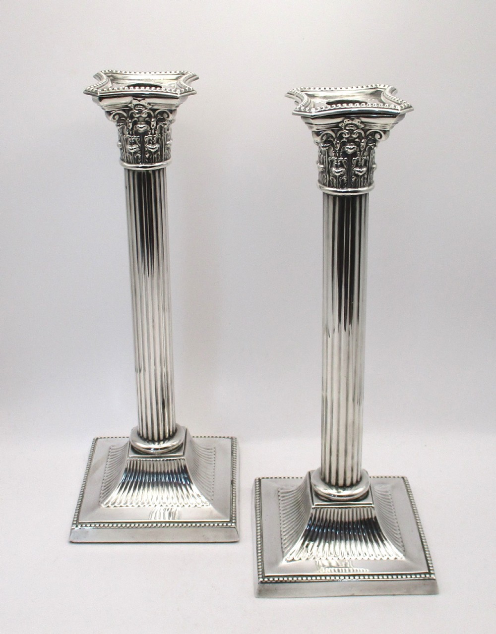 Large Pair of Silver Plated Corinthian Column Candlesticks