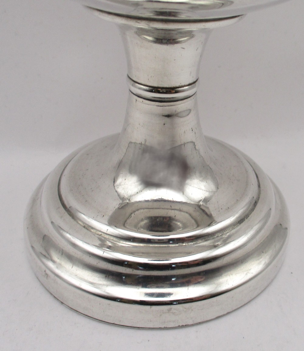 A 19th-century silver-plated two-handled loving cup with a gilt interior and central monogram engraving on a stepped circular pedestal base. View IV