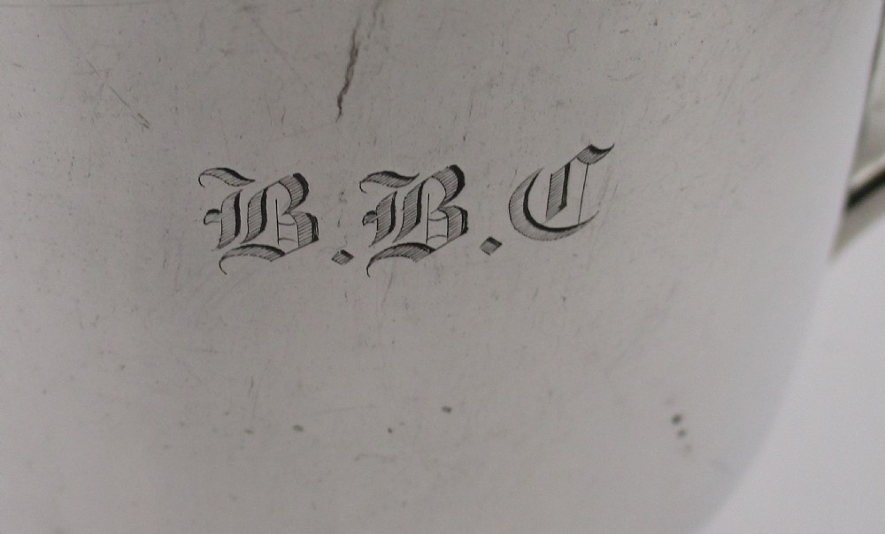 A 19th-century silver-plated two-handled loving cup with a gilt interior and central monogram engraving on a stepped circular pedestal base. View VI