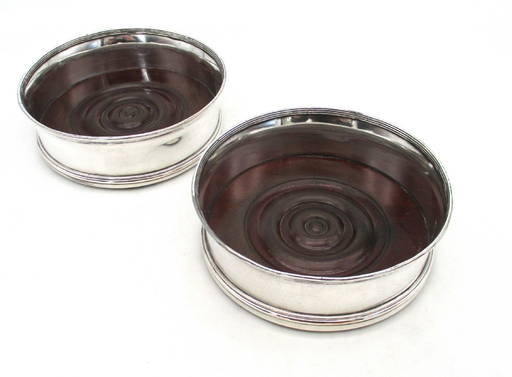 Fine Pair of Old Sheffield Plated Regency Coasters with Turned Mahogany Bases