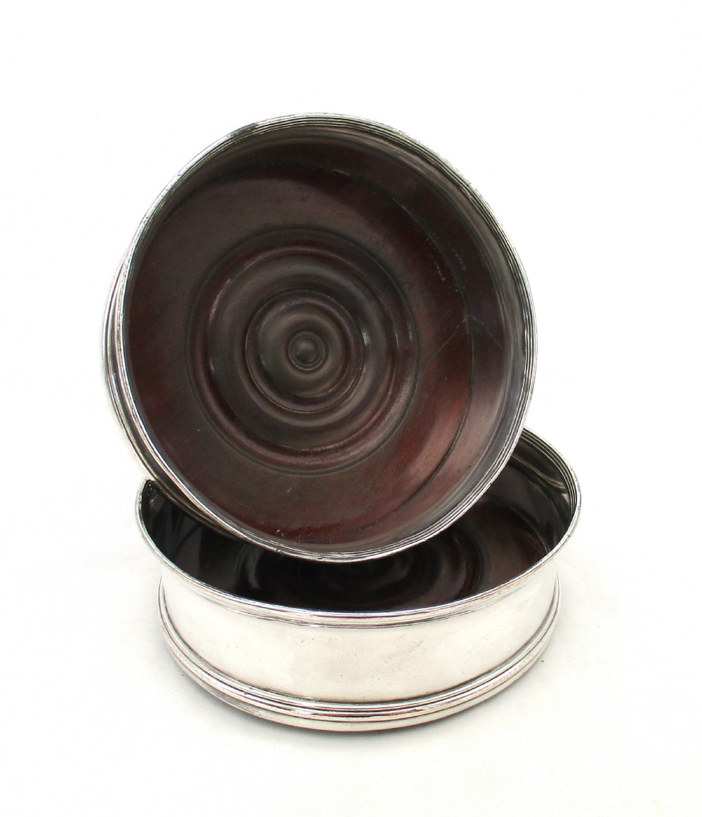 Fine Pair of Old Sheffield Plated Regency Coasters with Turned Mahogany Bases View V