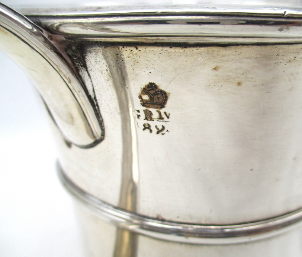 An antique silver-plated two-handled loving cup featuring a central girdle band, moulded foot, and an engraved monogram. View IV