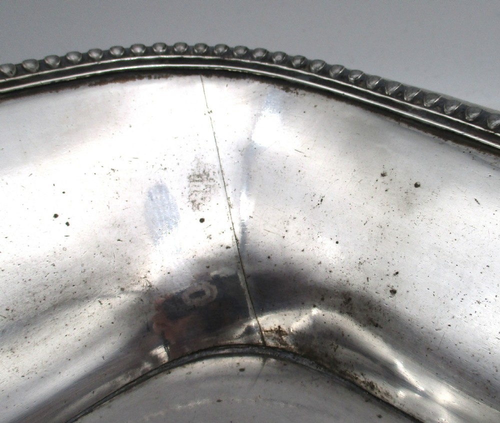 An elongated 19th-century Old Sheffield silver-plated tray featuring a rectangular form with rounded ends and a beaded outer rim. View VII