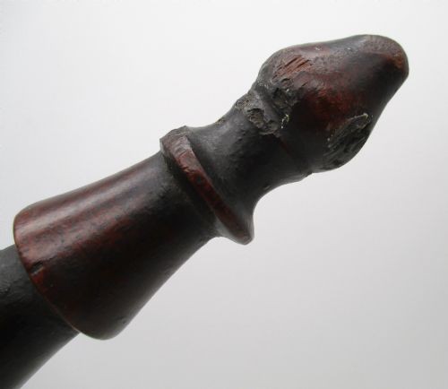 An antique Georgian dark mahogany wooden fire cat featuring six turned spindle limbs connected to a central turned joint. View VI