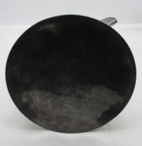 A pair of matching 19th-century pewter communion flagons featuring domed hinged lids, thumbpiece levers, scroll handles, and engraved inscriptions on the cylindrical bodies. View X