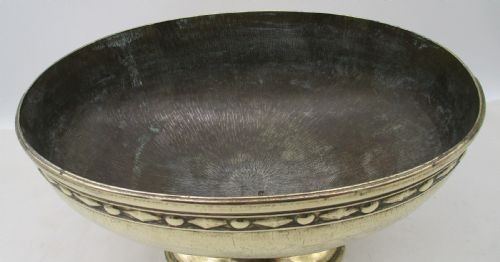 A pair of oval brass pedestal bowls with stamped geometric rim borders and turned flared bases. View III