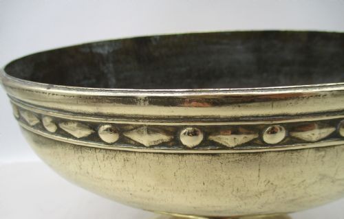 A pair of oval brass pedestal bowls with stamped geometric rim borders and turned flared bases. View V