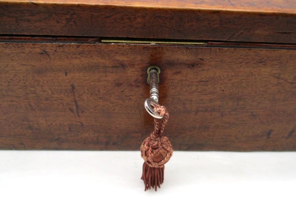 A rectangular mid-18th-century mahogany document box featuring a top brass swing handle, an engraved brass nameplate, and a brass keyhole escutcheon. View III