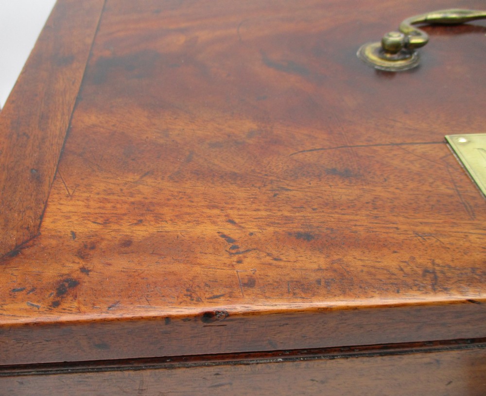 A rectangular mid-18th-century mahogany document box featuring a top brass swing handle, an engraved brass nameplate, and a brass keyhole escutcheon. View IV