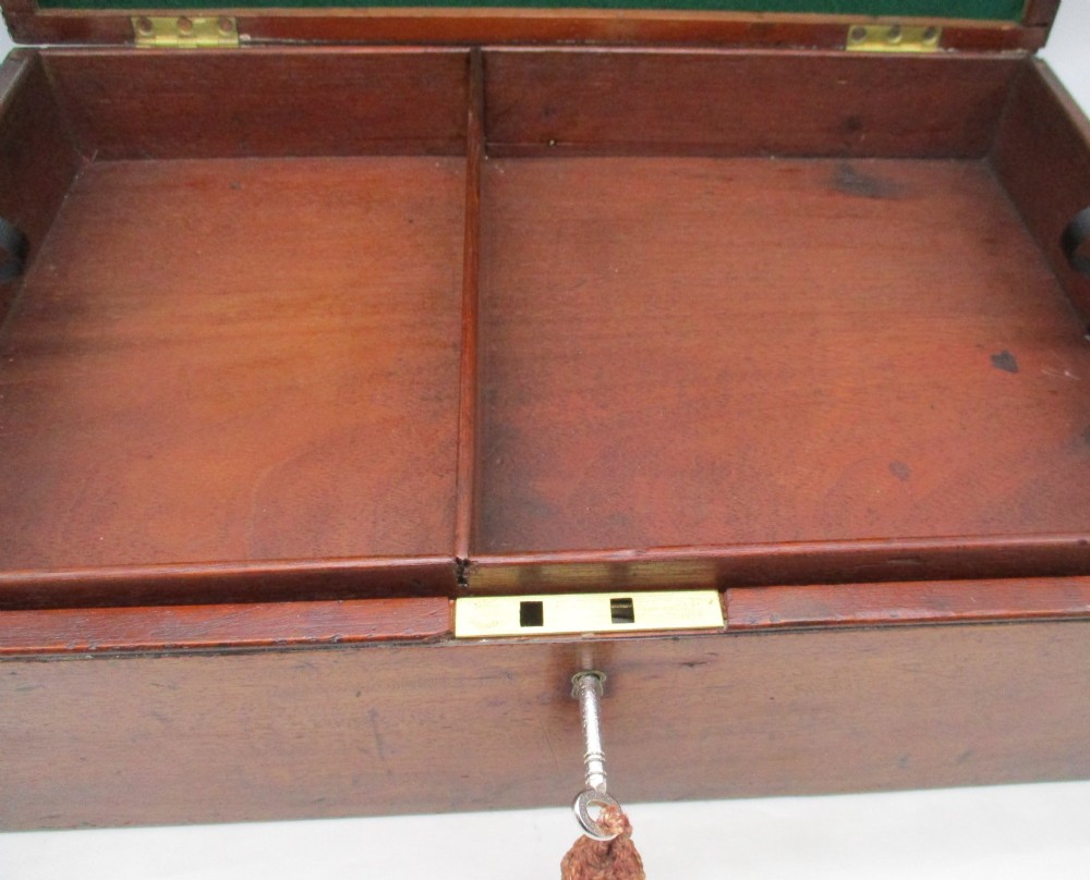 A rectangular mid-18th-century mahogany document box featuring a top brass swing handle, an engraved brass nameplate, and a brass keyhole escutcheon. View VII