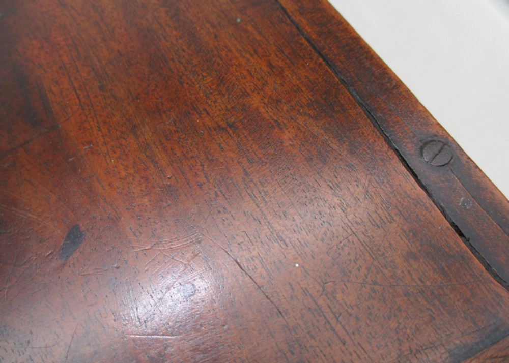 A rectangular mid-18th-century mahogany document box featuring a top brass swing handle, an engraved brass nameplate, and a brass keyhole escutcheon. View XIV