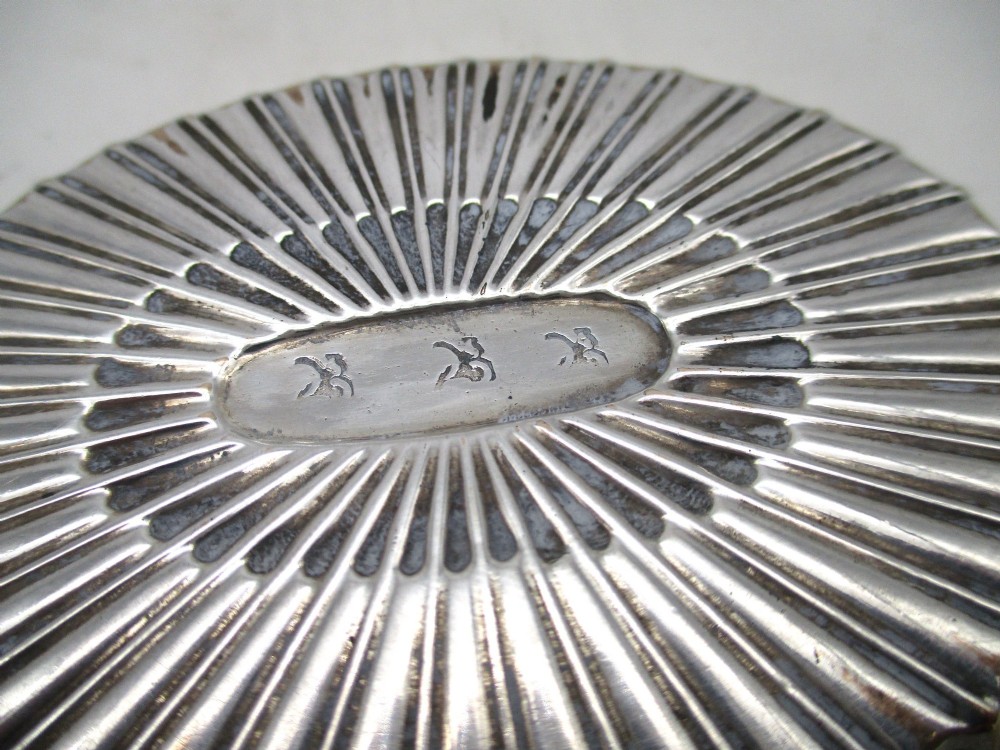 An 18th-century oval Old Sheffield Plated pin tray featuring fluted radiating panels, a smooth central oval, and a pierced scalloped rim. View V