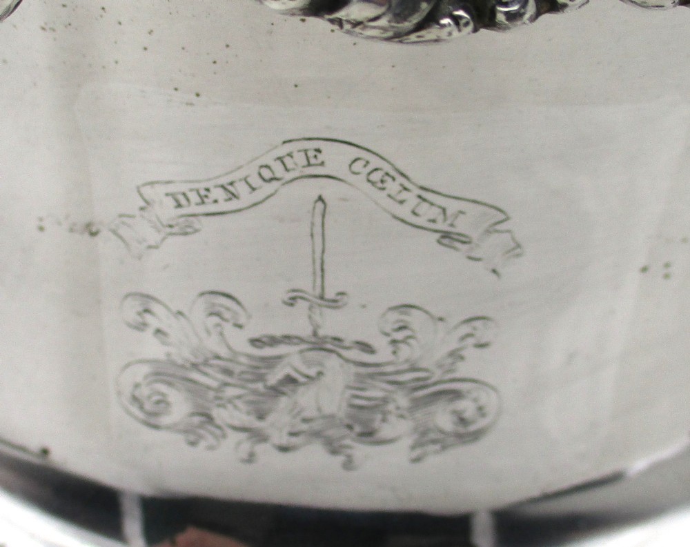 A Georgian silver-plated double-handled wine cooler featuring an engraved family crest, foliage borders, and a pedestal base. View III