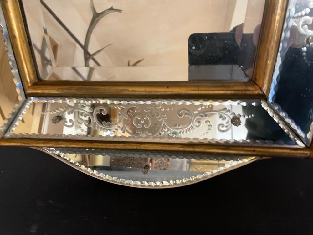 A rectangular Italian Venetian style wall mirror featuring etched glass floral borders, a gilt wood inner frame, and scalloped top and bottom mirrored extensions. View III