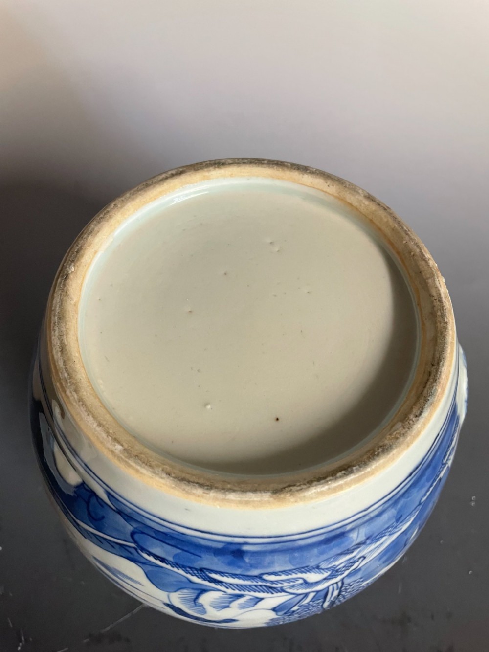 A blue and white Chinese export porcelain lidded jug featuring hand-painted pagoda landscape scenes and a foo dog lid finial. View VIII