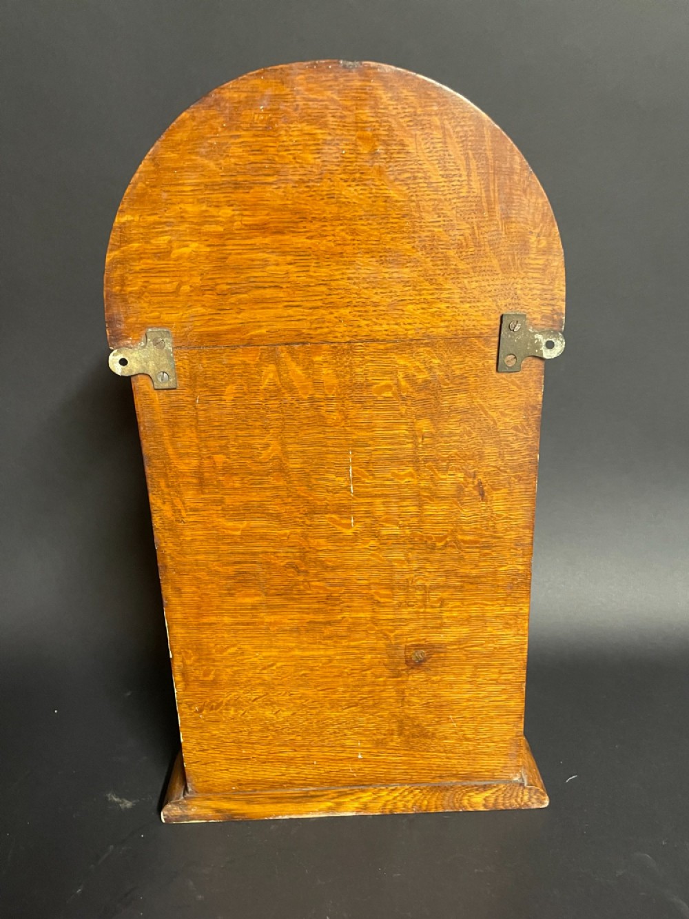 A Victorian oak tabletop letter box featuring brass fittings, a sloped aperture slot, glass side panels, and an arched brass top plate stamped LETTER BOX. View V